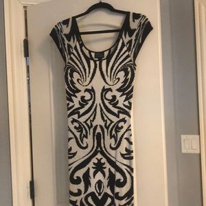 Tight stretchy torn multi black and white dress